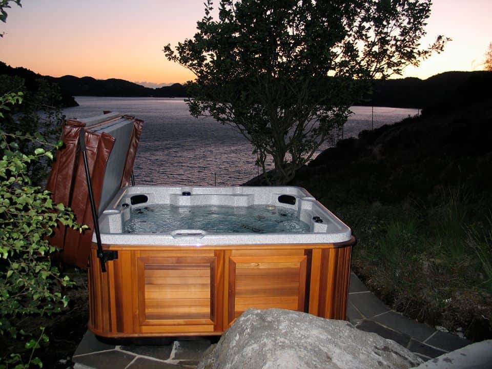 Arctic Spas Hot tub next to the lake